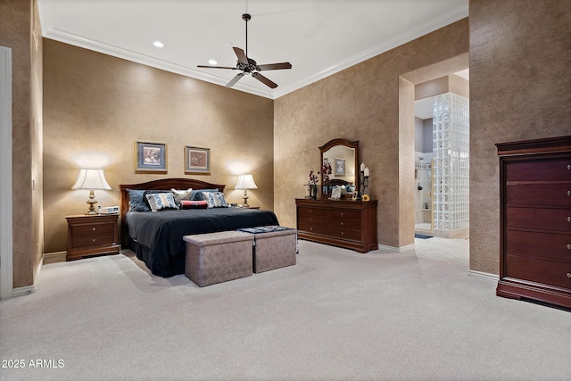 carpeted bedroom with ceiling fan, connected bathroom, recessed lighting, baseboards, and crown molding