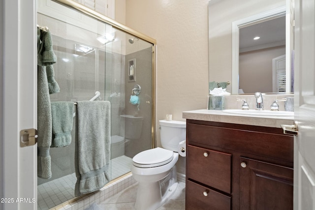 full bath featuring toilet, a stall shower, tile patterned flooring, and vanity