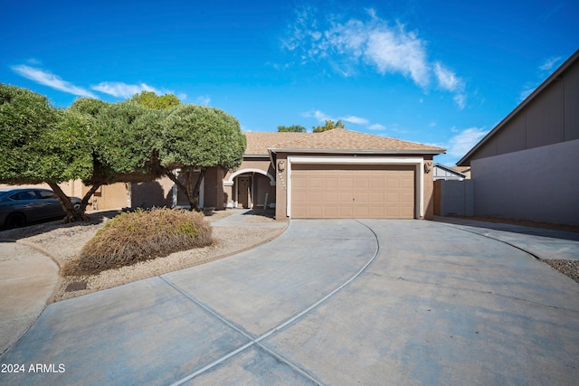 ranch-style home with a garage