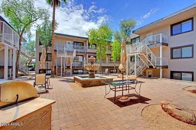 724 E Devonshire Ave Unit 108, Phoenix, AZ 85014 - view of home's community featuring stairs