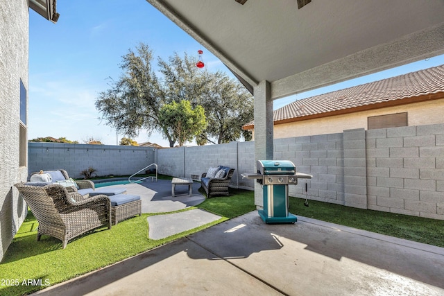 view of patio / terrace featuring area for grilling and an outdoor hangout area