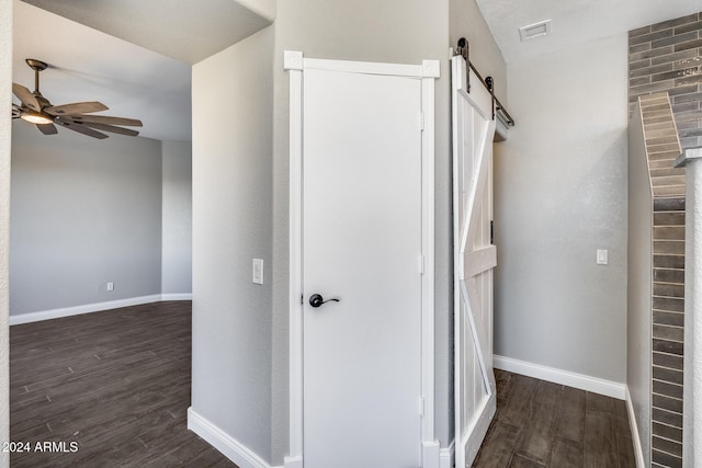 bathroom featuring wood-type flooring and ceiling fan