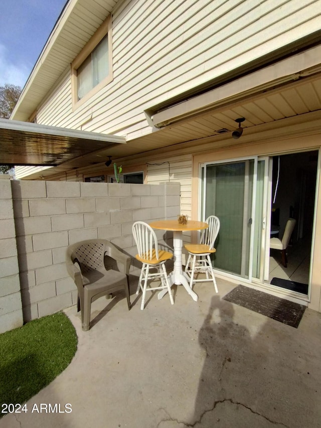 view of patio / terrace featuring ceiling fan