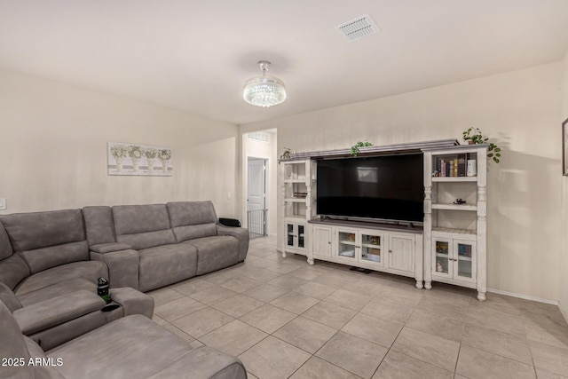 living room with light tile patterned floors