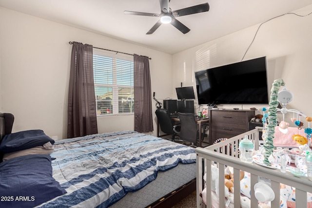 carpeted bedroom with ceiling fan