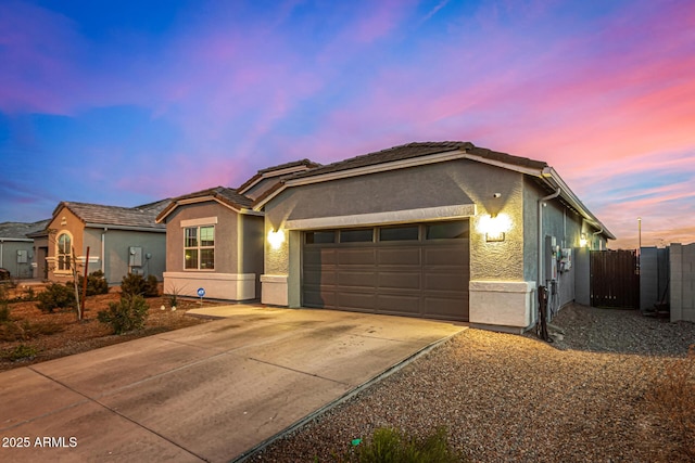 ranch-style house featuring a garage