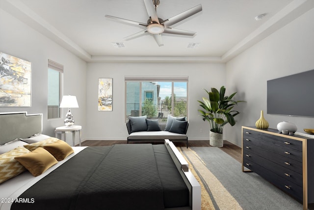 bedroom with ceiling fan and dark wood-type flooring