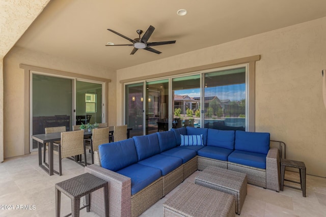 view of patio featuring an outdoor living space and ceiling fan