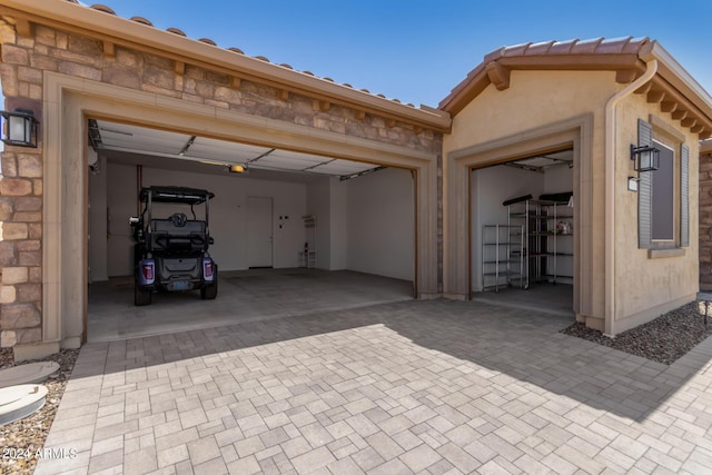 garage featuring a garage door opener