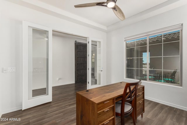 office with ceiling fan, dark hardwood / wood-style flooring, and french doors