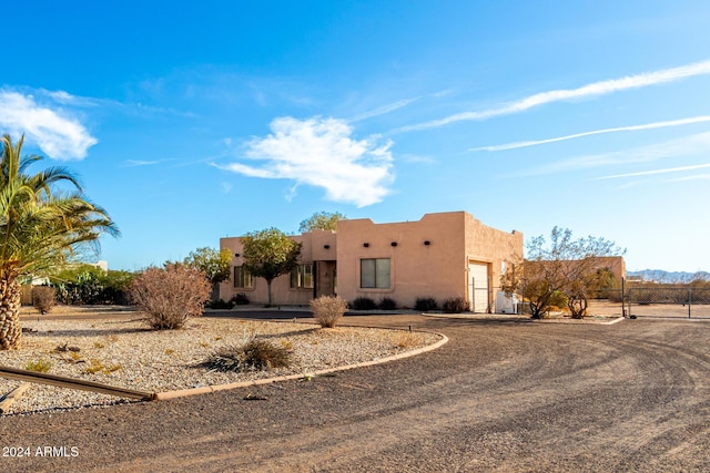 view of pueblo revival-style home