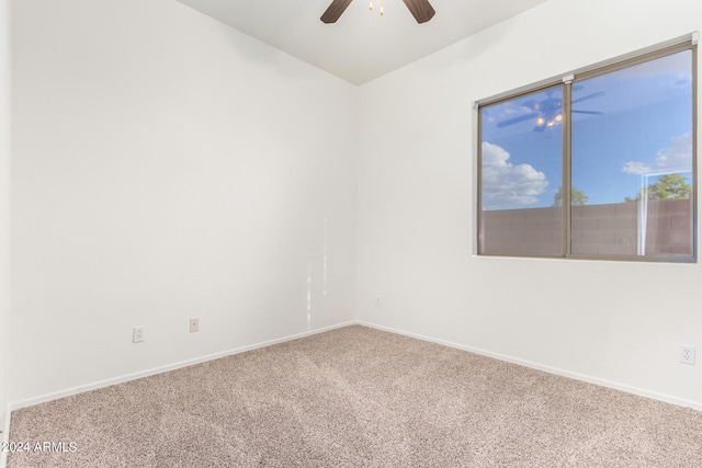 unfurnished room featuring carpet floors and ceiling fan