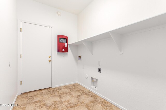 laundry room featuring electric dryer hookup, hookup for a washing machine, and gas dryer hookup