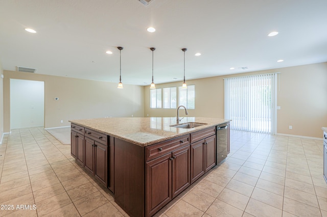kitchen featuring a sink, stainless steel dishwasher, a center island with sink, visible vents, and recessed lighting