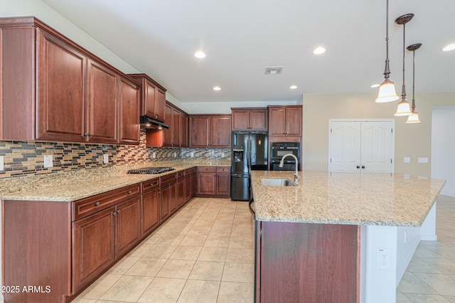 kitchen featuring decorative backsplash, a sink, black appliances, and visible vents