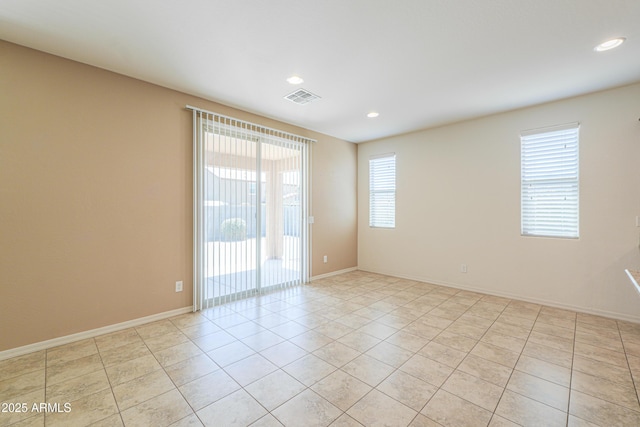 spare room with recessed lighting, baseboards, light tile patterned flooring, and visible vents