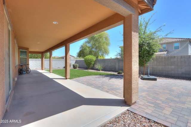view of patio featuring a fenced backyard
