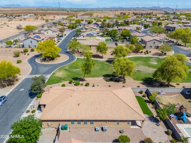 birds eye view of property with a residential view and a mountain view