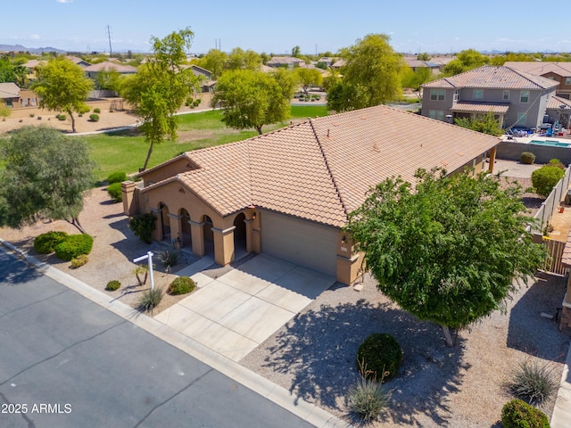 birds eye view of property with a residential view