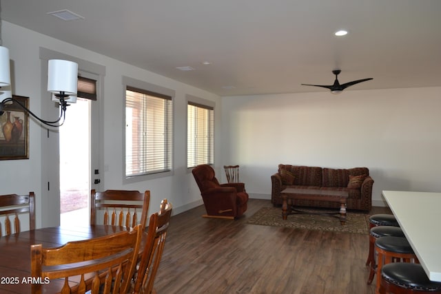 dining space featuring dark wood-style floors, recessed lighting, baseboards, and a ceiling fan