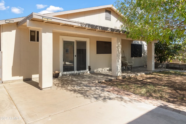 rear view of house with a patio