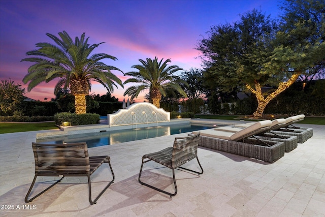 pool with a patio