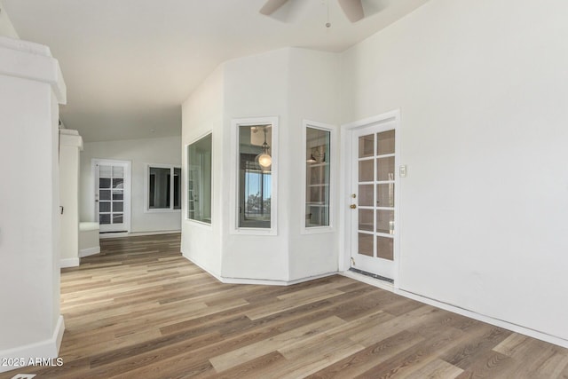 15009 E Palomino Blvd, Fountain Hills, AZ 85268 - empty room with wood finished floors, a ceiling fan, and lofted ceiling