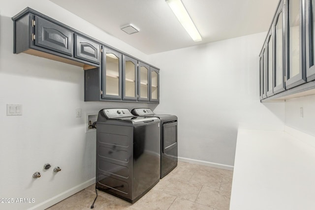 15009 E Palomino Blvd, Fountain Hills, AZ 85268 - laundry area featuring independent washer and dryer, cabinet space, and light tile patterned flooring