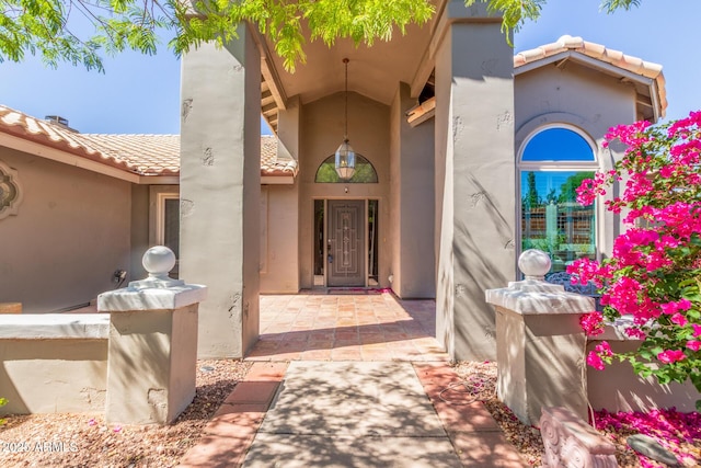 15009 E Palomino Blvd, Fountain Hills, AZ 85268 - doorway to property featuring a tiled roof and stucco siding