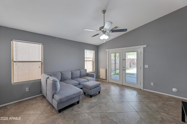 living room with a ceiling fan, french doors, visible vents, baseboards, and lofted ceiling
