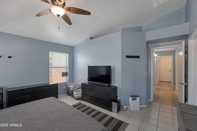 bedroom featuring ceiling fan, visible vents, baseboards, lofted ceiling, and light tile patterned flooring