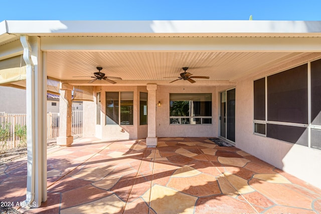 view of patio featuring ceiling fan