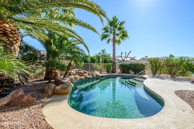 view of swimming pool featuring a patio area