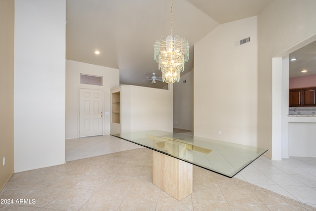 unfurnished room with light tile patterned floors, ceiling fan with notable chandelier, and vaulted ceiling