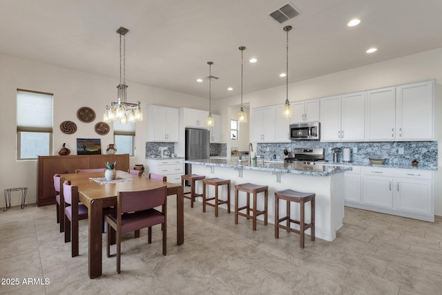 dining space with sink