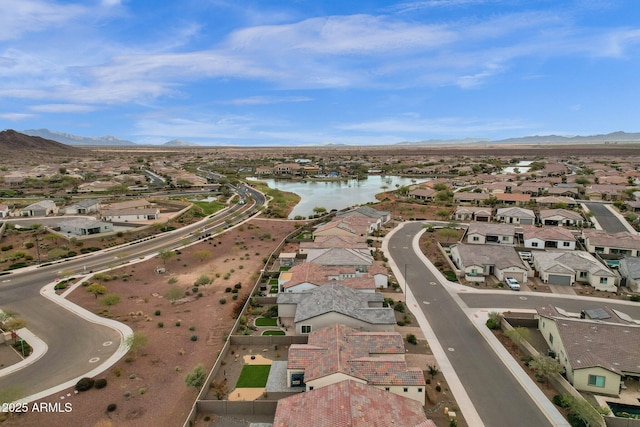 aerial view with a water and mountain view