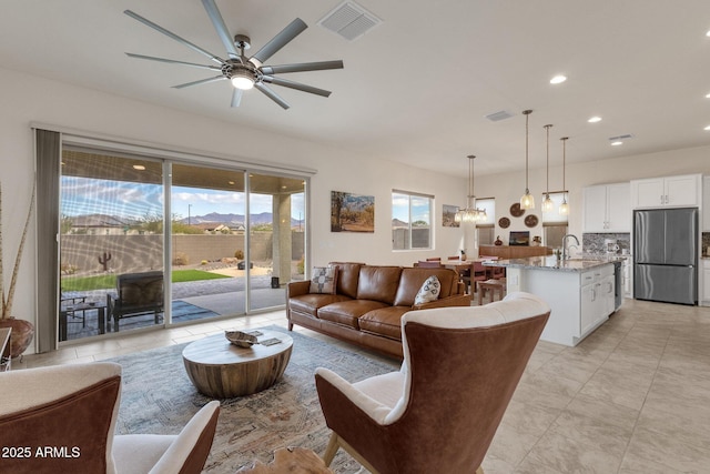 living room with ceiling fan