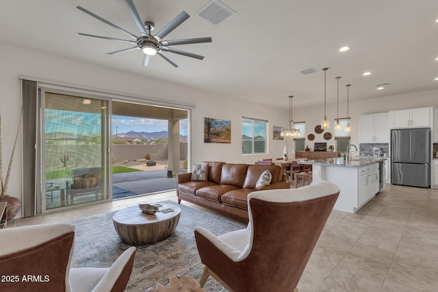 living room featuring ceiling fan