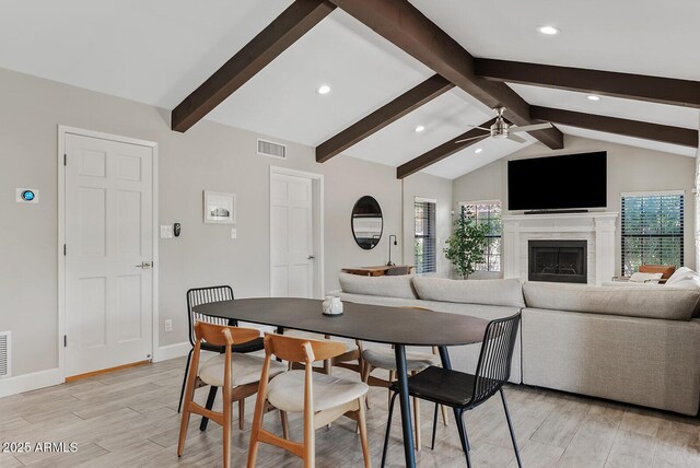8361 E San Rafael Dr, Scottsdale, AZ 85258 - dining space with light wood-style flooring, ceiling fan, recessed lighting, and a fireplace