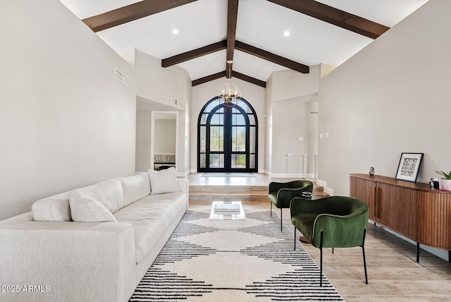 8361 E San Rafael Dr, Scottsdale, AZ 85258 - living area featuring a chandelier, light wood finished floors, recessed lighting, and french doors