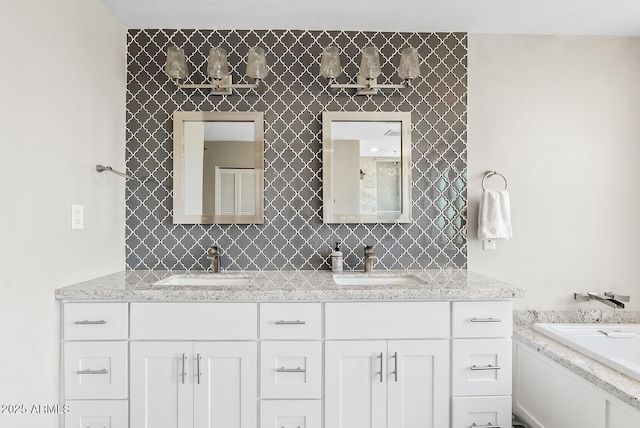 8361 E San Rafael Dr, Scottsdale, AZ 85258 - full bathroom with double vanity, backsplash, and a bathtub