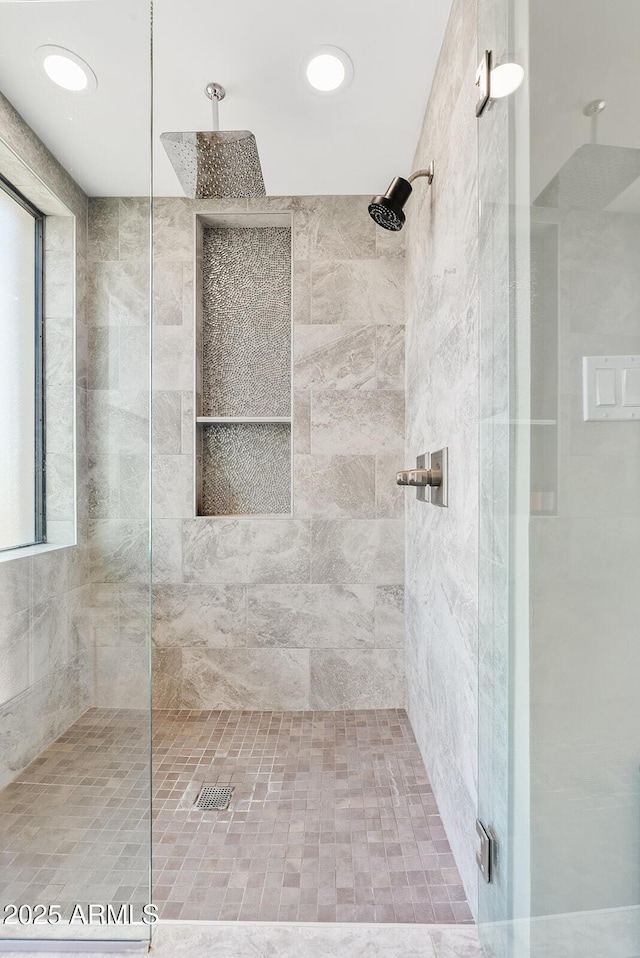 8361 E San Rafael Dr, Scottsdale, AZ 85258 - bathroom featuring a tile shower