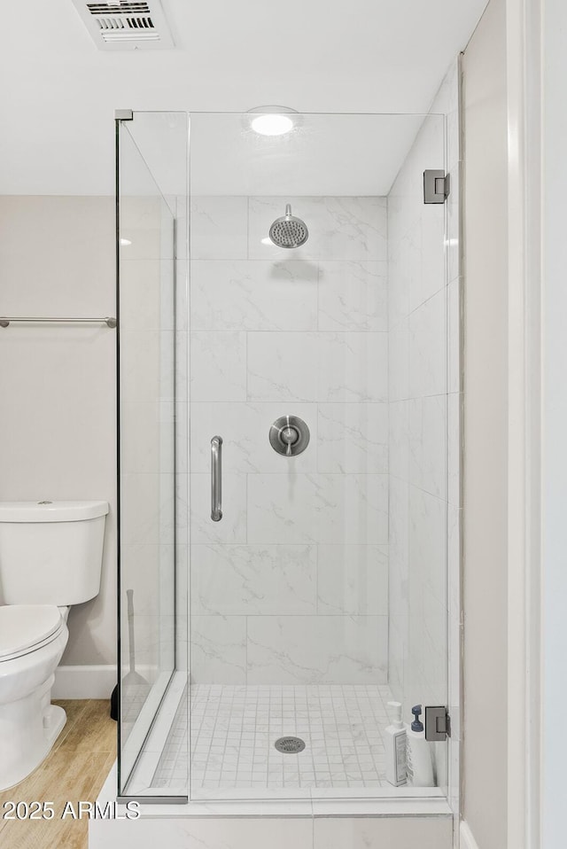 8361 E San Rafael Dr, Scottsdale, AZ 85258 - full bath with a stall shower and wood finished floors