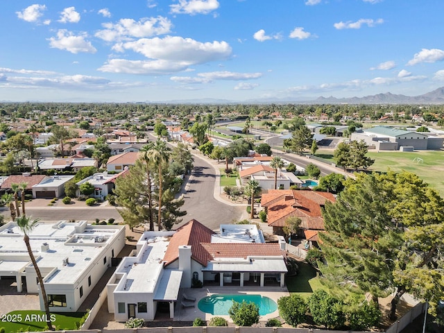 8361 E San Rafael Dr, Scottsdale, AZ 85258 - aerial perspective of suburban area with a pool area and mountains