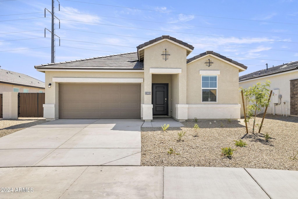 view of front of property with a garage