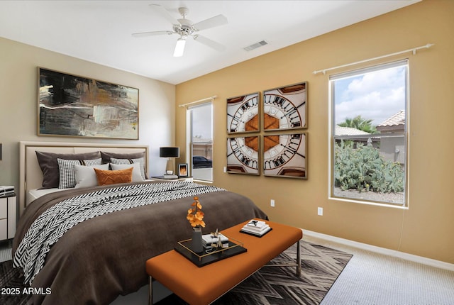19803 N Desert Song Ct, Surprise, AZ 85374 - carpeted bedroom featuring baseboards and ceiling fan