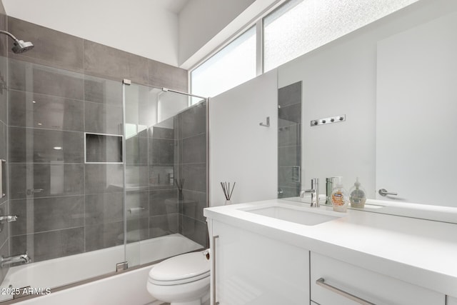 540 W Mariposa St Unit 9, Phoenix, AZ 85013 - full bathroom featuring toilet, combined bath / shower with glass door, and vanity