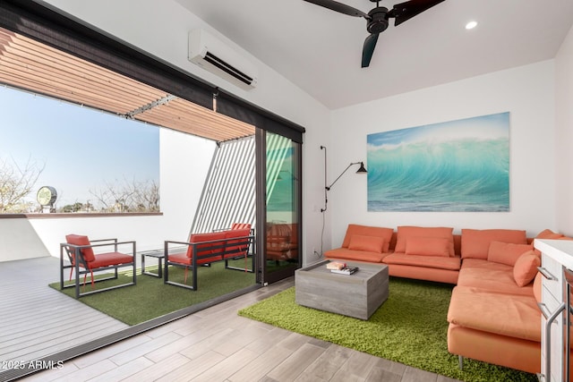 540 W Mariposa St Unit 9, Phoenix, AZ 85013 - living room featuring a wall mounted air conditioner, wood finished floors, a ceiling fan, and recessed lighting