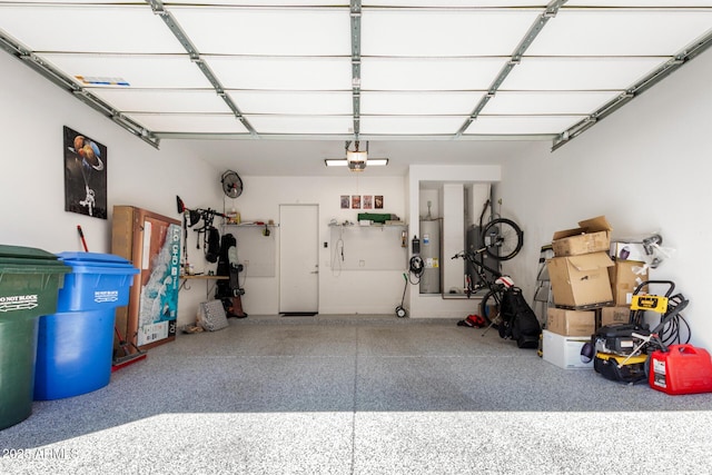 540 W Mariposa St Unit 9, Phoenix, AZ 85013 - garage with a garage door opener and water heater