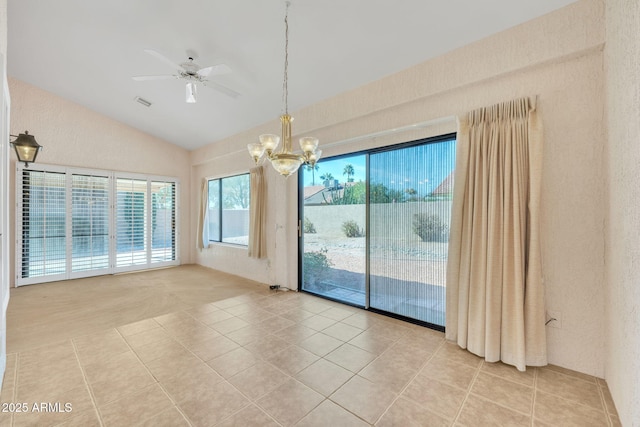 unfurnished room with lofted ceiling, light carpet, ceiling fan with notable chandelier, and light tile patterned flooring